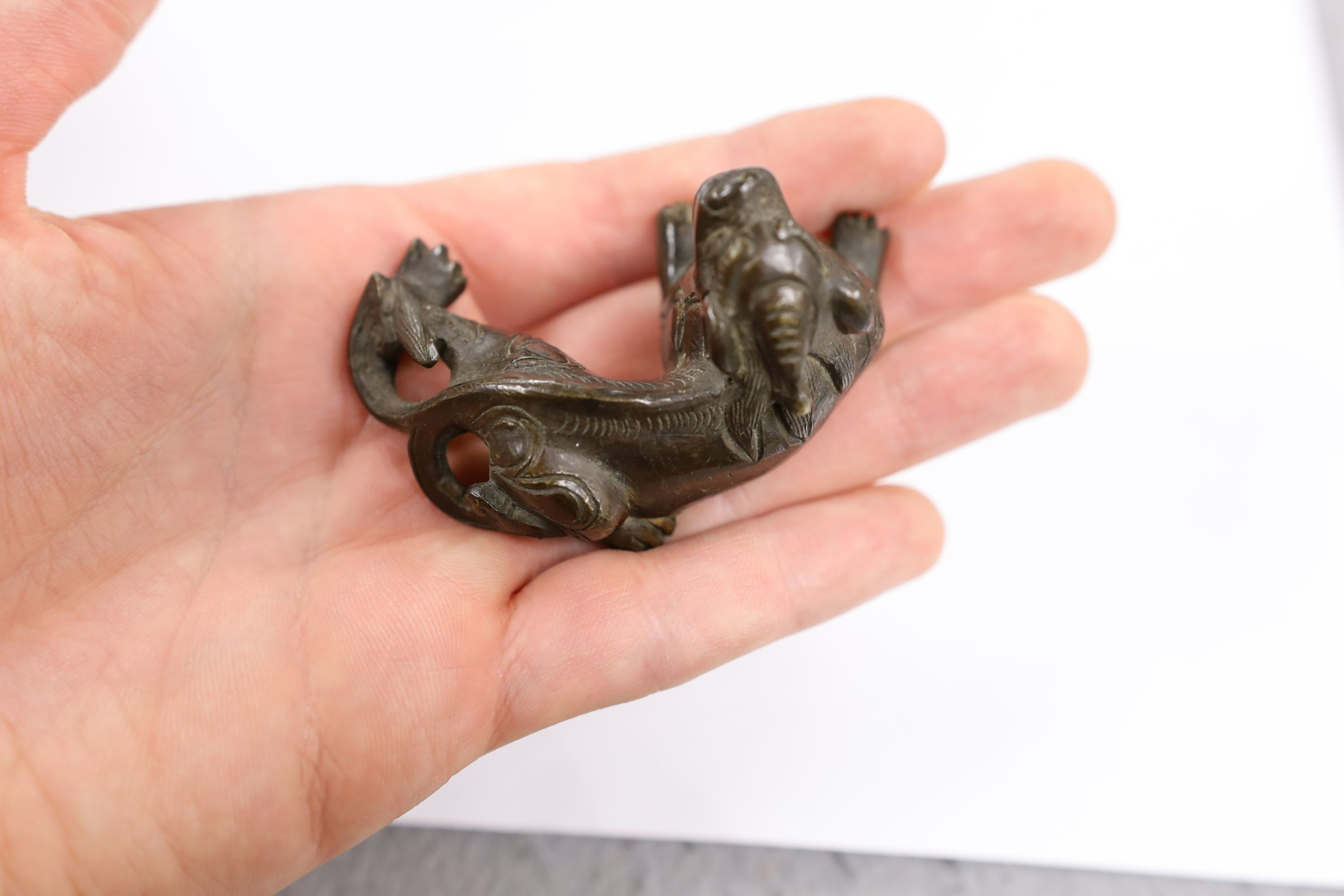 Five Chinese or Tibetan bronze figures or Buddhist implements, tallest 13cms high
